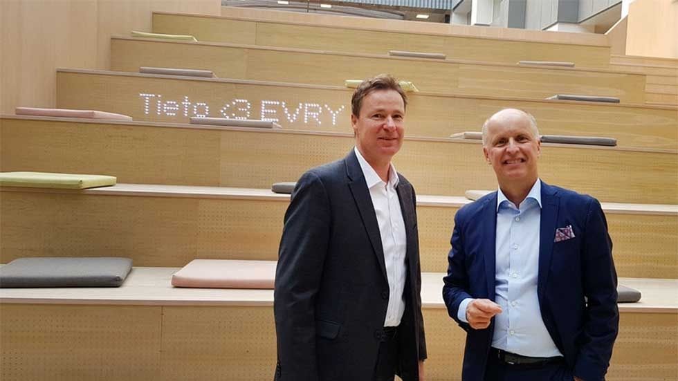 Evrys koncernchef Per Hove (t.v) och Tietos koncernchef Kimmo Alkio på Evrys kontor i Solna.