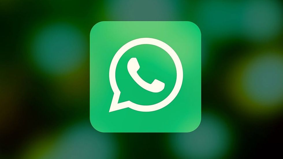 Whatsapp-ikon på suddig bakgrund